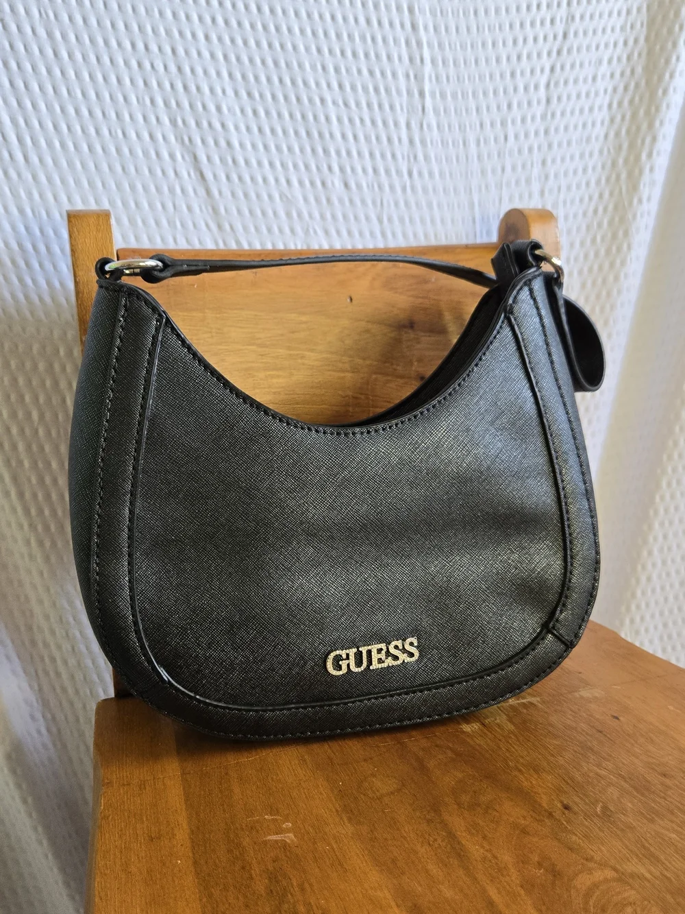 GUESS Black Crescent Shoulder Bag with Gold Logo